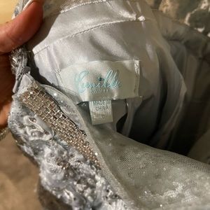 A Camille La Vil size 0 will fit size 1